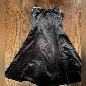 Love, Nickie Lew black velvet party dress with rhinestone bow, size 12